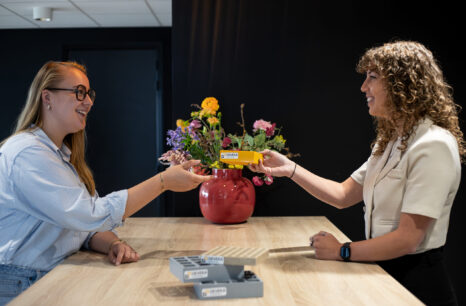 Two employees give Geveka grid sample